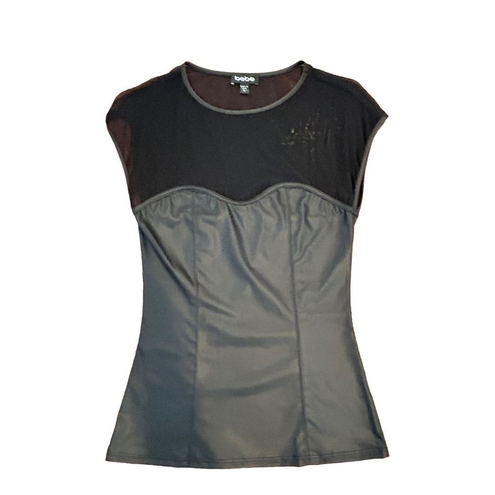#Bebe black shirt with #mesh and #pleader combo. Great choice for a night out or
